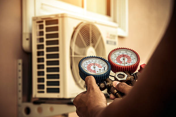 Professional Heat Pump Repair technician working in Madison, NC